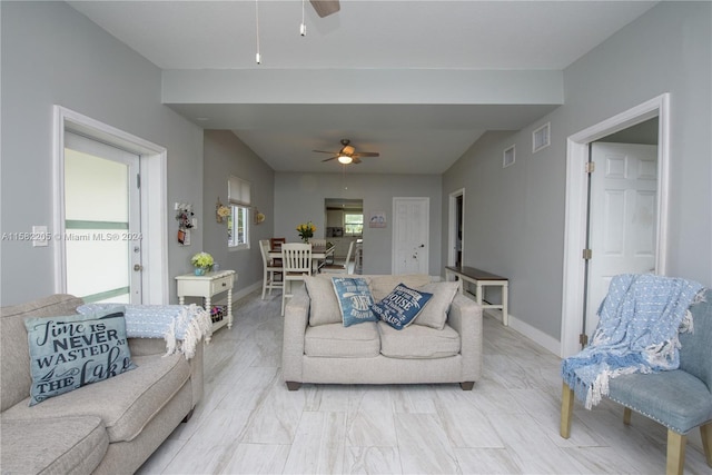 living room featuring ceiling fan