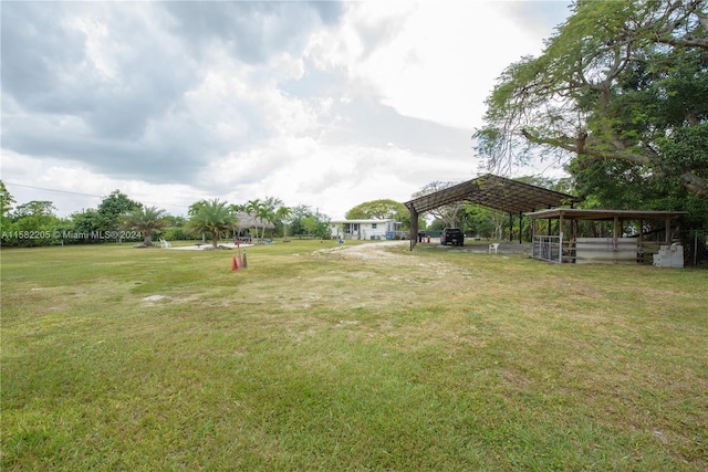 view of yard with a carport