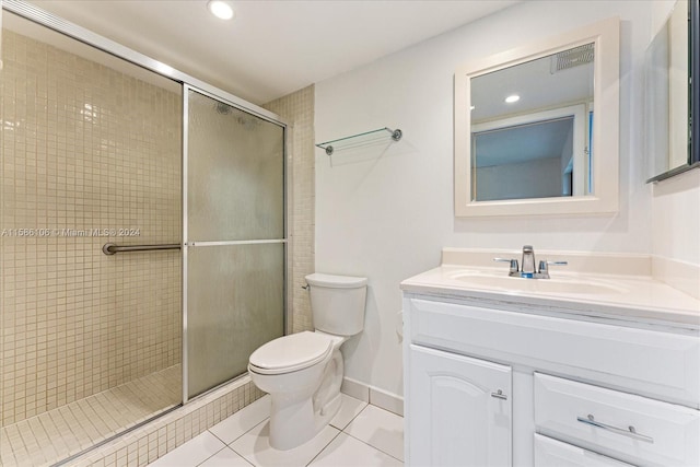 bathroom featuring tile floors, walk in shower, toilet, and vanity