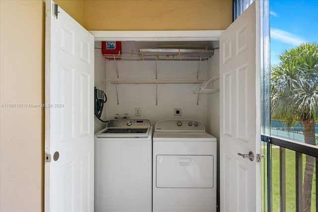 clothes washing area featuring hookup for an electric dryer and independent washer and dryer