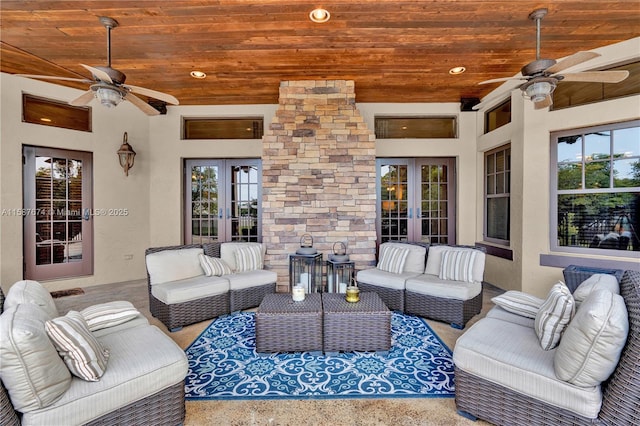 view of patio / terrace featuring ceiling fan, an outdoor hangout area, and french doors