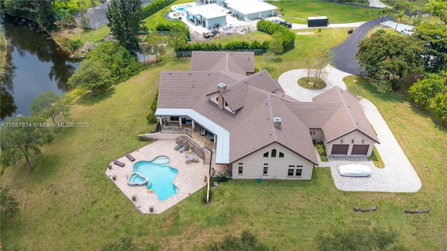 drone / aerial view featuring a water view