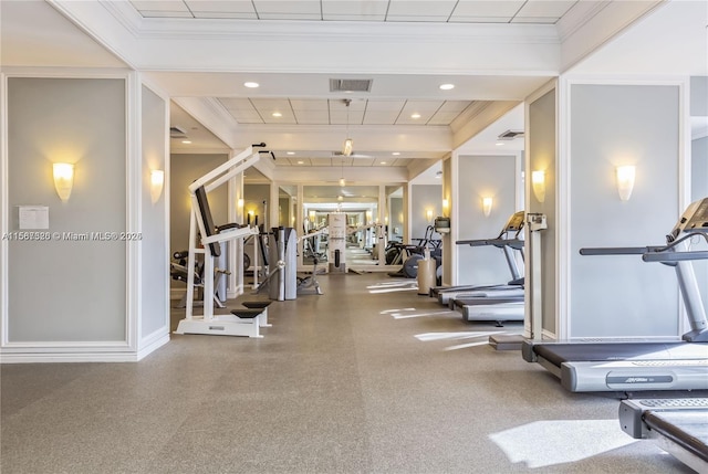 gym with ornamental molding, recessed lighting, and visible vents