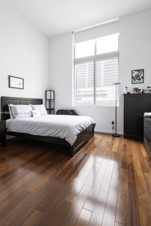 bedroom with wood-type flooring