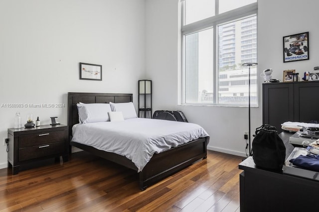 bedroom featuring hardwood / wood-style floors