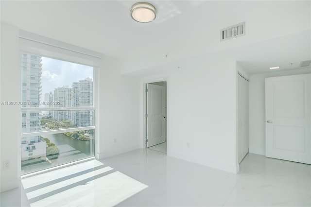 view of tiled spare room