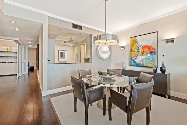 dining room featuring dark wood-type flooring