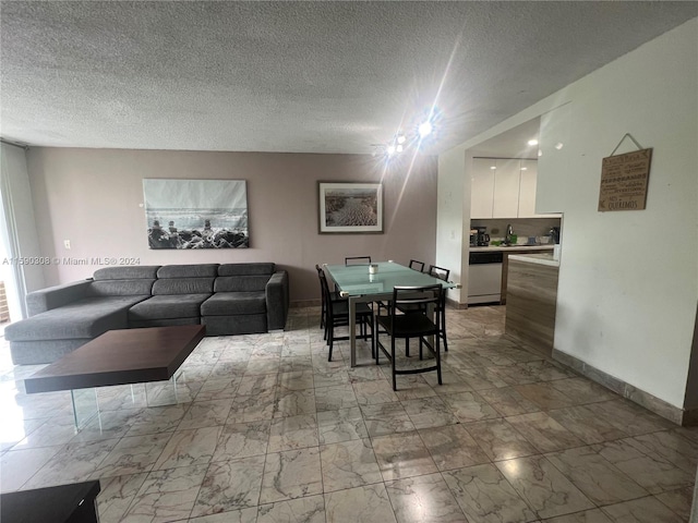 dining area with a textured ceiling