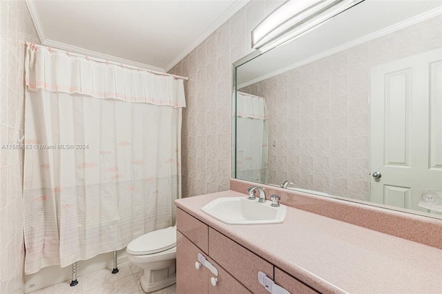 bathroom with crown molding, tile flooring, tile walls, vanity, and toilet