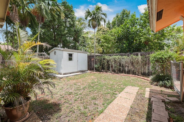 view of yard with a storage shed