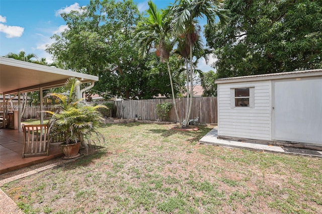 view of yard with a storage unit