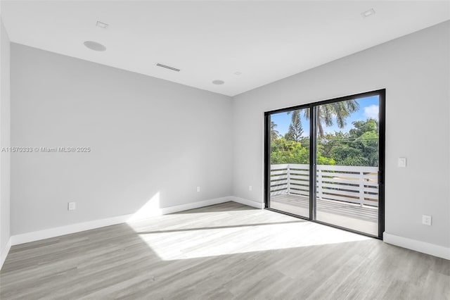 empty room featuring light hardwood / wood-style flooring