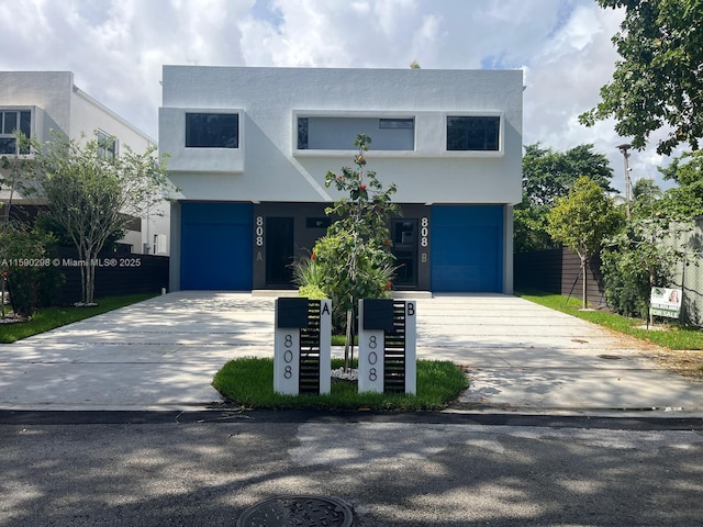 808 SW 9th St Unit 808-B, Fort Lauderdale, FL 33315 - view of front of property with stucco siding and concrete driveway