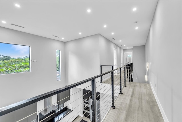 808 SW 9th St Unit 808-B, Fort Lauderdale, FL 33315 - corridor featuring an upstairs landing, recessed lighting, and light wood finished floors
