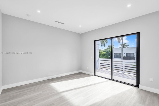 808 SW 9th St Unit 808-B, Fort Lauderdale, FL 33315 - spare room with light wood-style flooring and recessed lighting