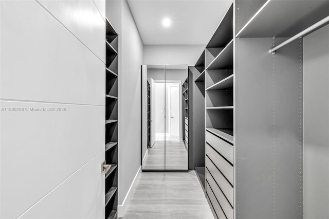 808 SW 9th St Unit 808-B, Fort Lauderdale, FL 33315 - spacious closet featuring light wood finished floors