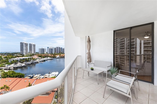 balcony featuring a water view