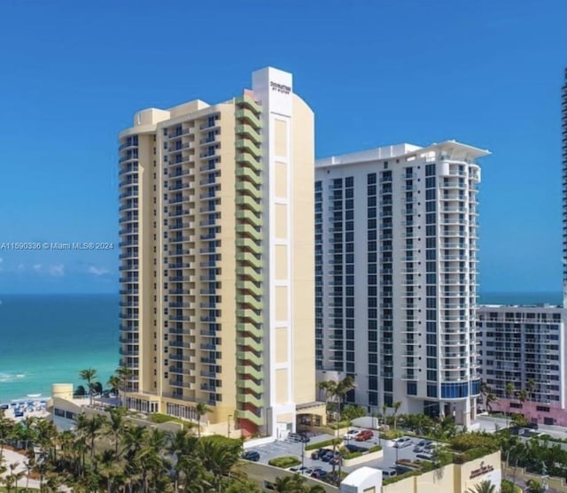 view of building exterior with a water view