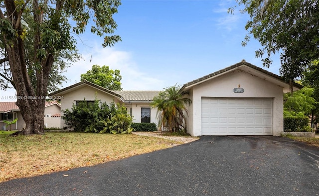 ranch-style house with a garage