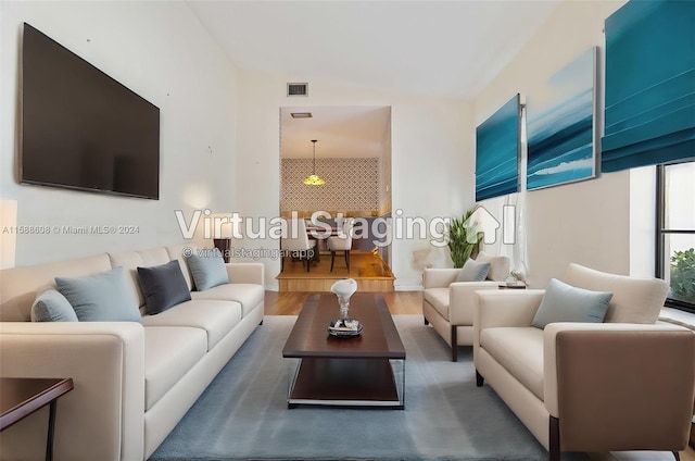 living room featuring dark hardwood / wood-style flooring