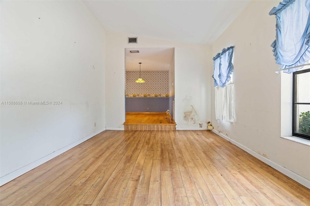 unfurnished living room with light wood-type flooring