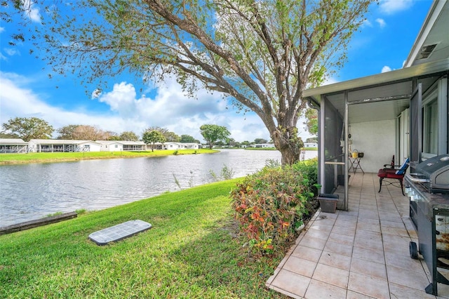 view of yard with a water view