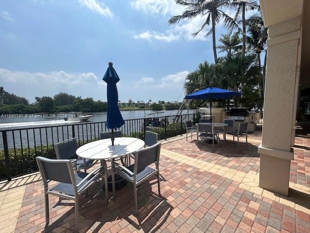 view of patio / terrace featuring a water view