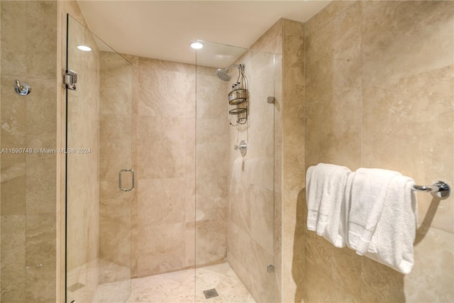 bathroom featuring an enclosed shower