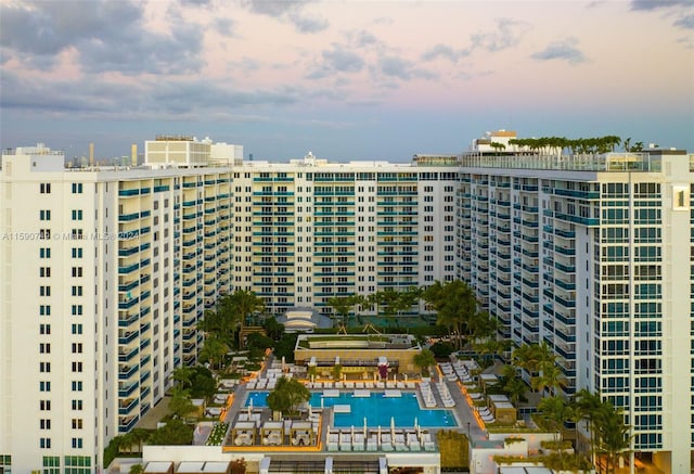 view of property featuring a community pool