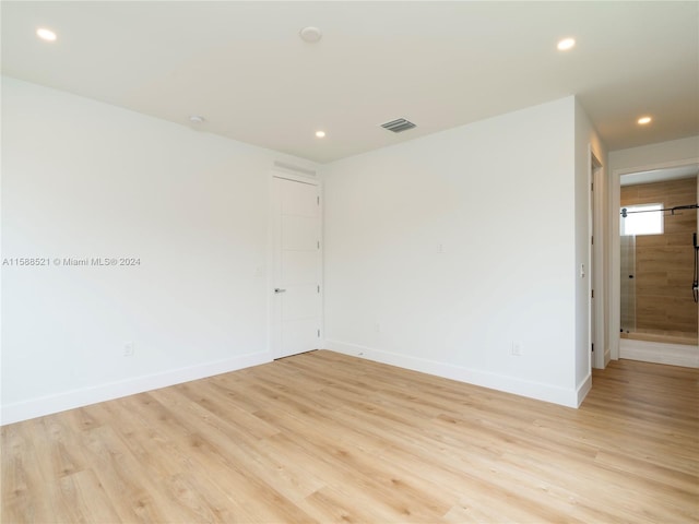 empty room featuring light hardwood / wood-style floors