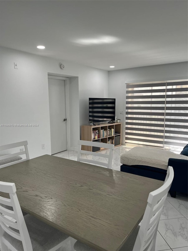 view of tiled dining space