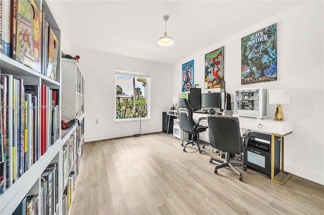 office space with light wood-type flooring