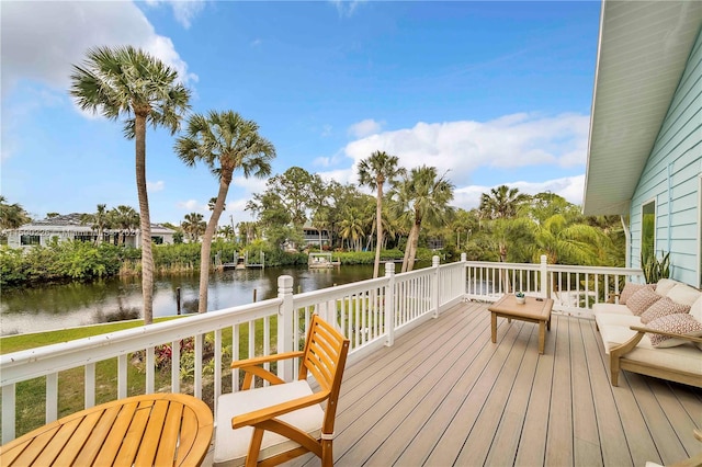 wooden terrace with a water view