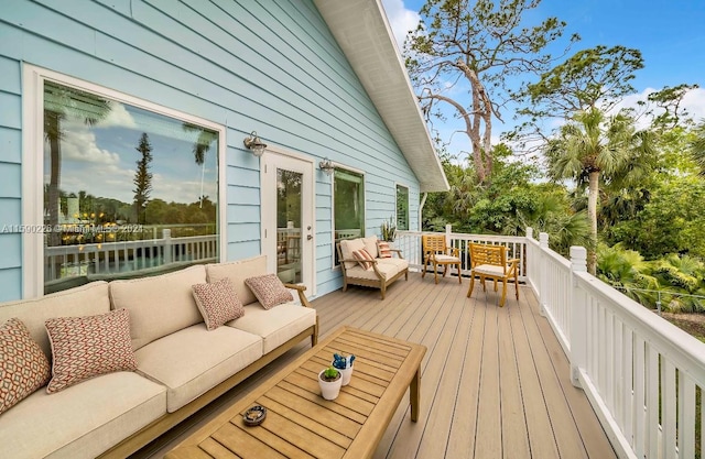 wooden deck featuring outdoor lounge area