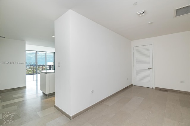 view of tiled spare room