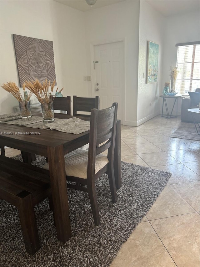 view of tiled dining space