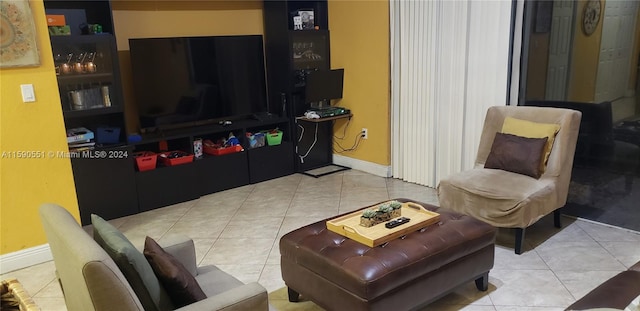 living room with light tile patterned floors