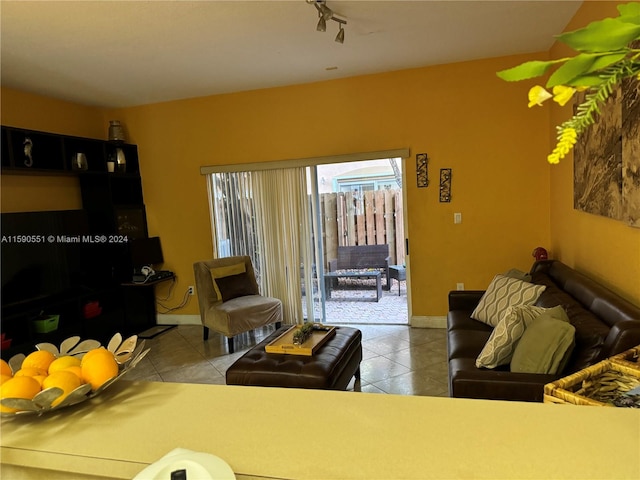 living room with light tile patterned flooring