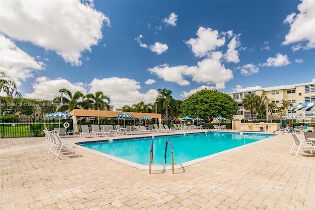 view of swimming pool featuring a patio