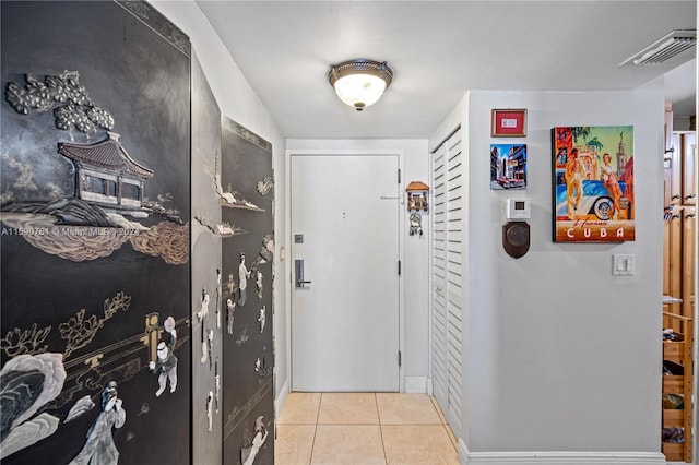 interior space with light tile floors