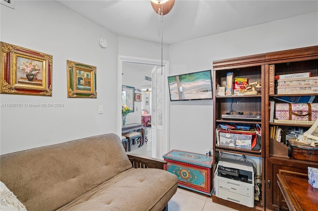 living area featuring light tile floors