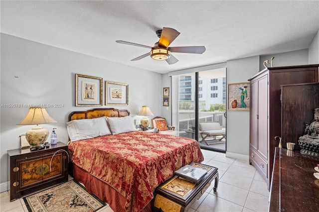 bedroom featuring ceiling fan, a textured ceiling, access to outside, and light tile floors