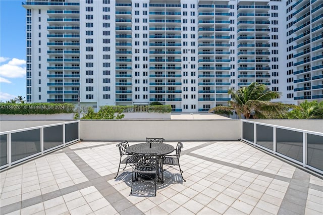 view of patio with a balcony