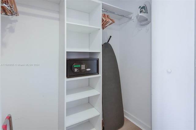 walk in closet featuring hardwood / wood-style floors