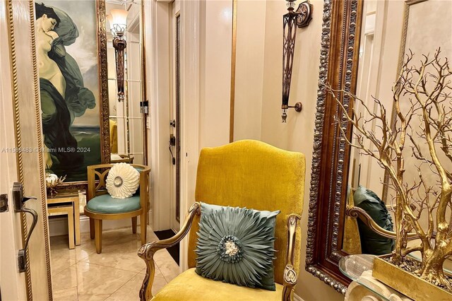 sitting room with tile flooring