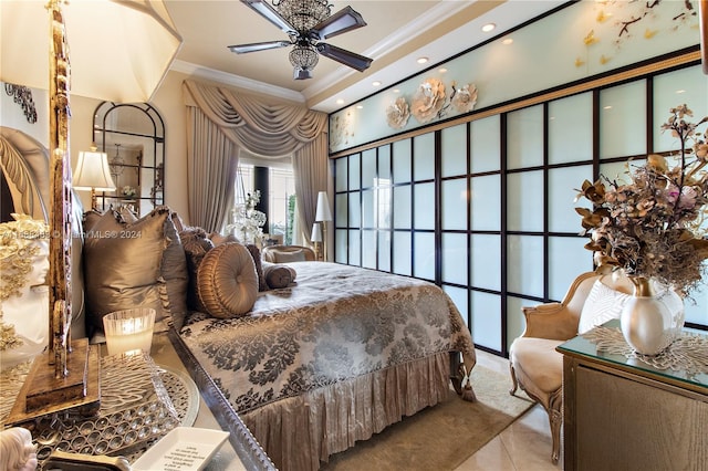 bedroom with ceiling fan and ornamental molding