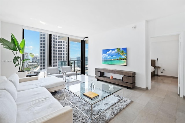 living room with floor to ceiling windows