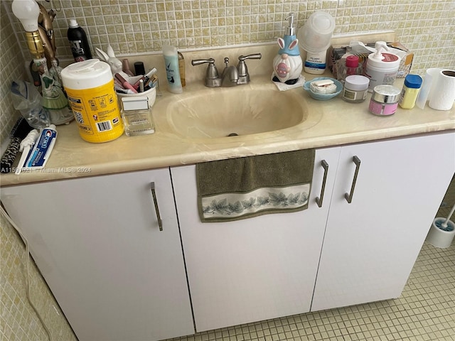 interior space featuring tile floors and vanity