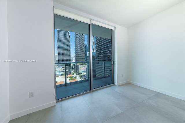 view of tiled spare room