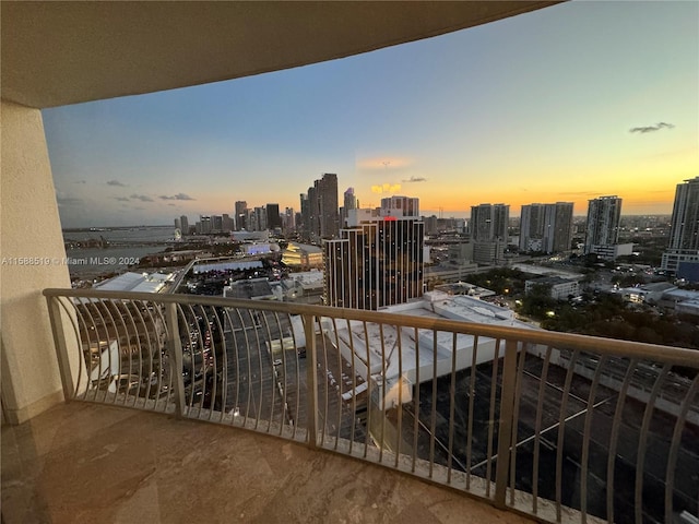 view of balcony at dusk